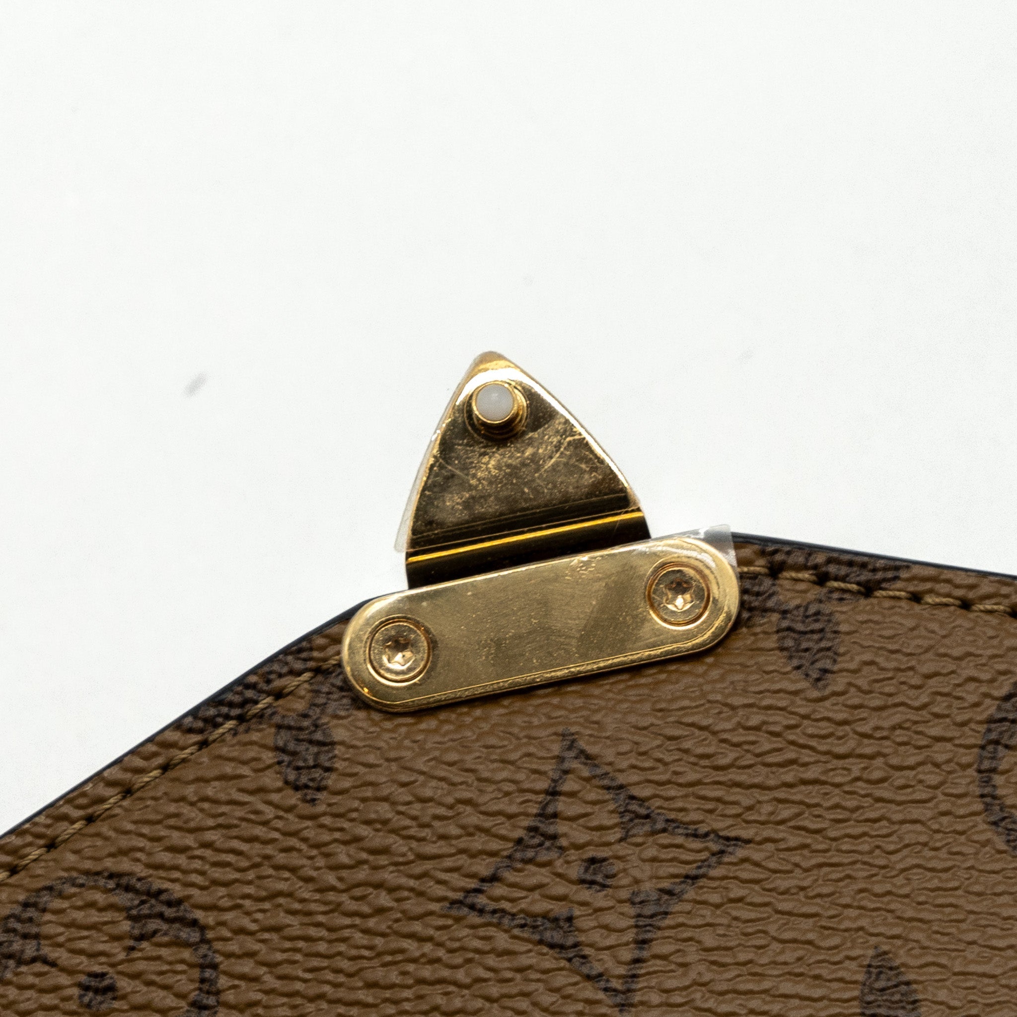 AAA Replica Louis Vuitton LV POCHETTE MÉTIS MONOGRAM REVERSE CANVAS GHW