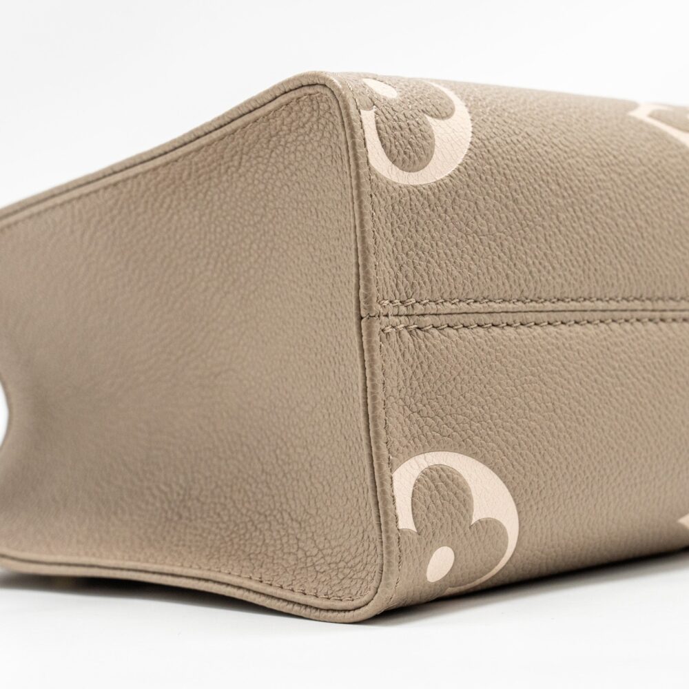 AAA Replica Louis Vuitton LV ONTHEGO PM BICOLOUR MONOGRAM EMPREINTE LEATHER TOURTERELLE/CREME GHW
