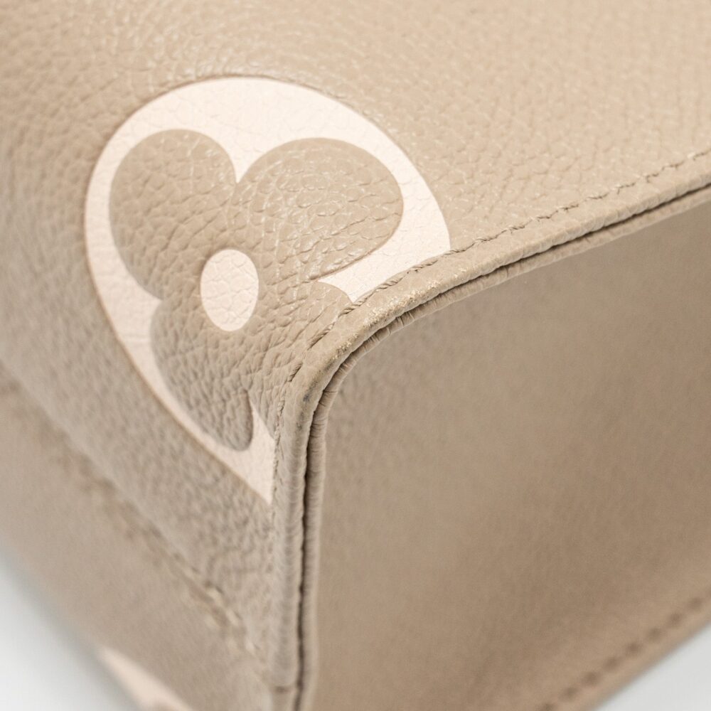 AAA Replica Louis Vuitton LV ONTHEGO PM BICOLOUR MONOGRAM EMPREINTE LEATHER TOURTERELLE/CREME GHW
