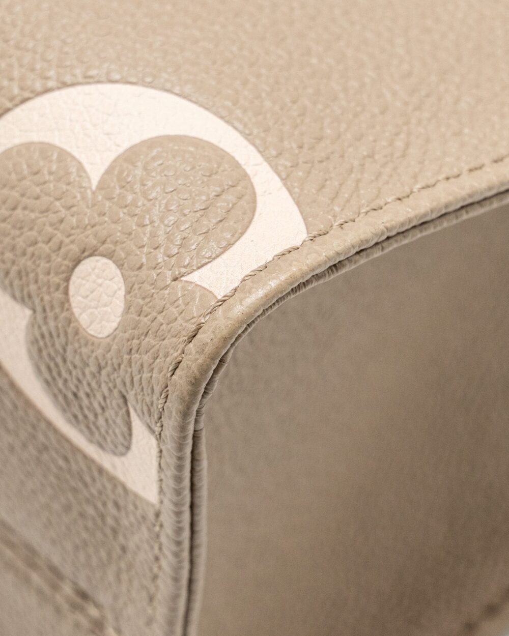 AAA Replica Louis Vuitton LV ONTHEGO PM BICOLOUR MONOGRAM EMPREINTE LEATHER TOURTERELLE/CREME GHW