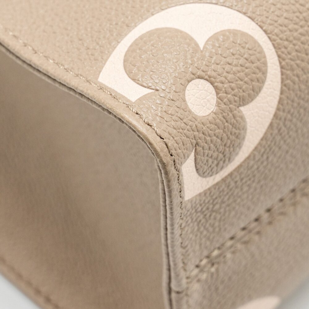 AAA Replica Louis Vuitton LV ONTHEGO PM BICOLOUR MONOGRAM EMPREINTE LEATHER TOURTERELLE/CREME GHW