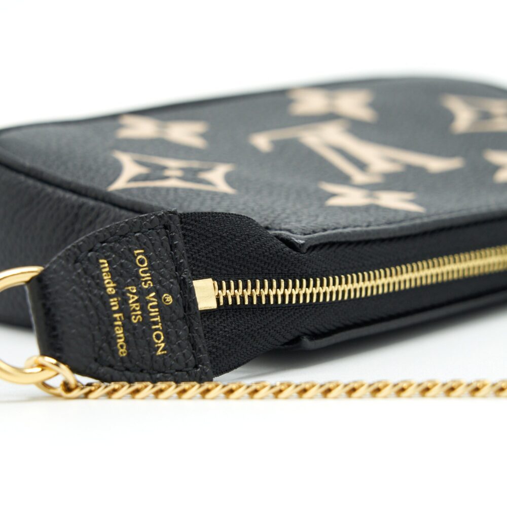 AAA Replica Louis Vuitton LV MINI POCHETTE ACCESSORIES BICOLOUR MONOGRAM ‘EM-REINTEGRATION BLACK SHW