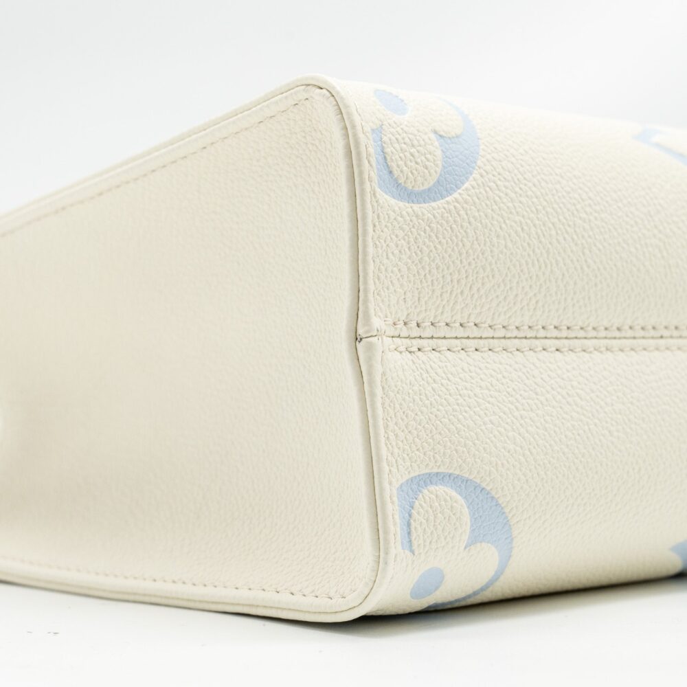 AAA Replica Louis Vuitton LV ONTHEGO PM BICOLOUR MONOGRAM EMPREINTE LATTE/CANDY BLUE GHW