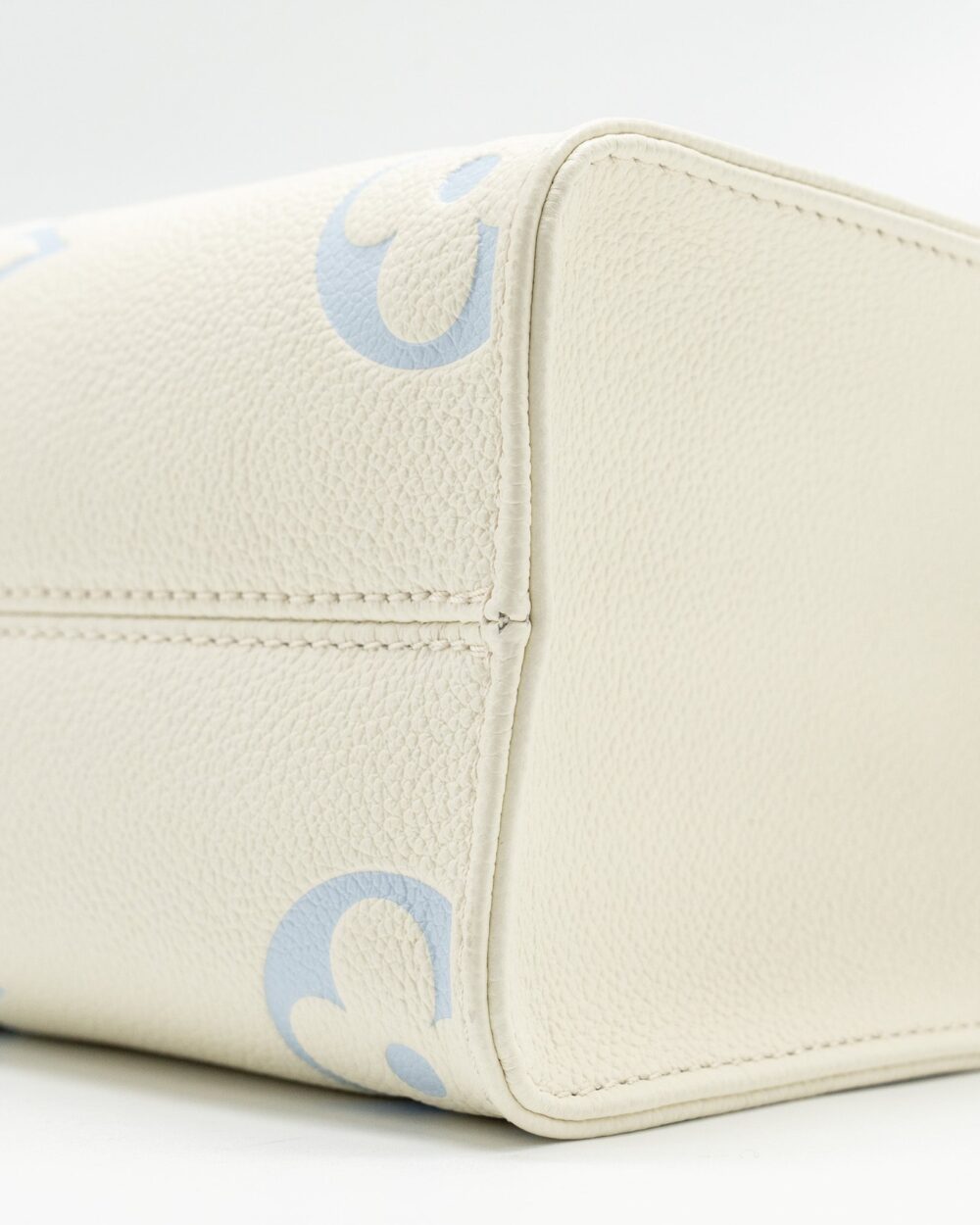 AAA Replica Louis Vuitton LV ONTHEGO PM BICOLOUR MONOGRAM EMPREINTE LATTE/CANDY BLUE GHW