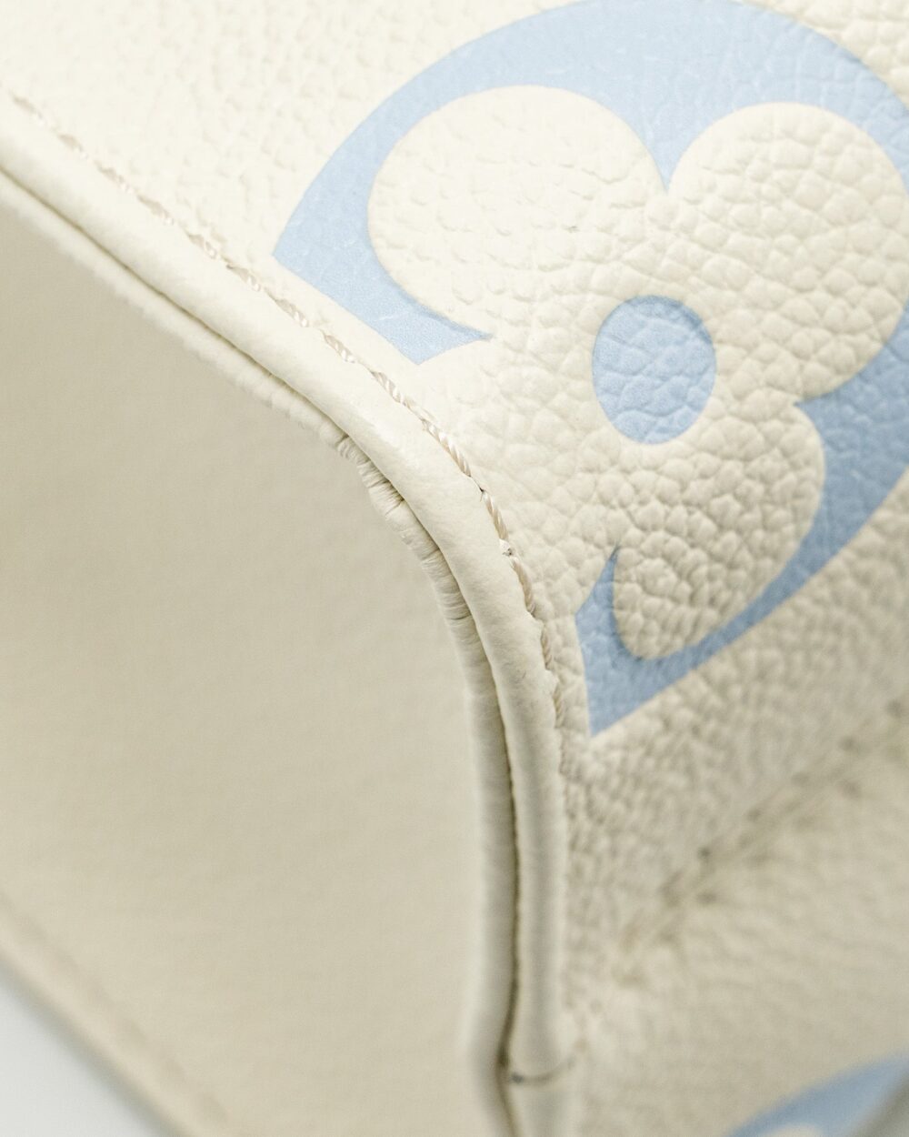 AAA Replica Louis Vuitton LV ONTHEGO PM BICOLOUR MONOGRAM EMPREINTE LATTE/CANDY BLUE GHW
