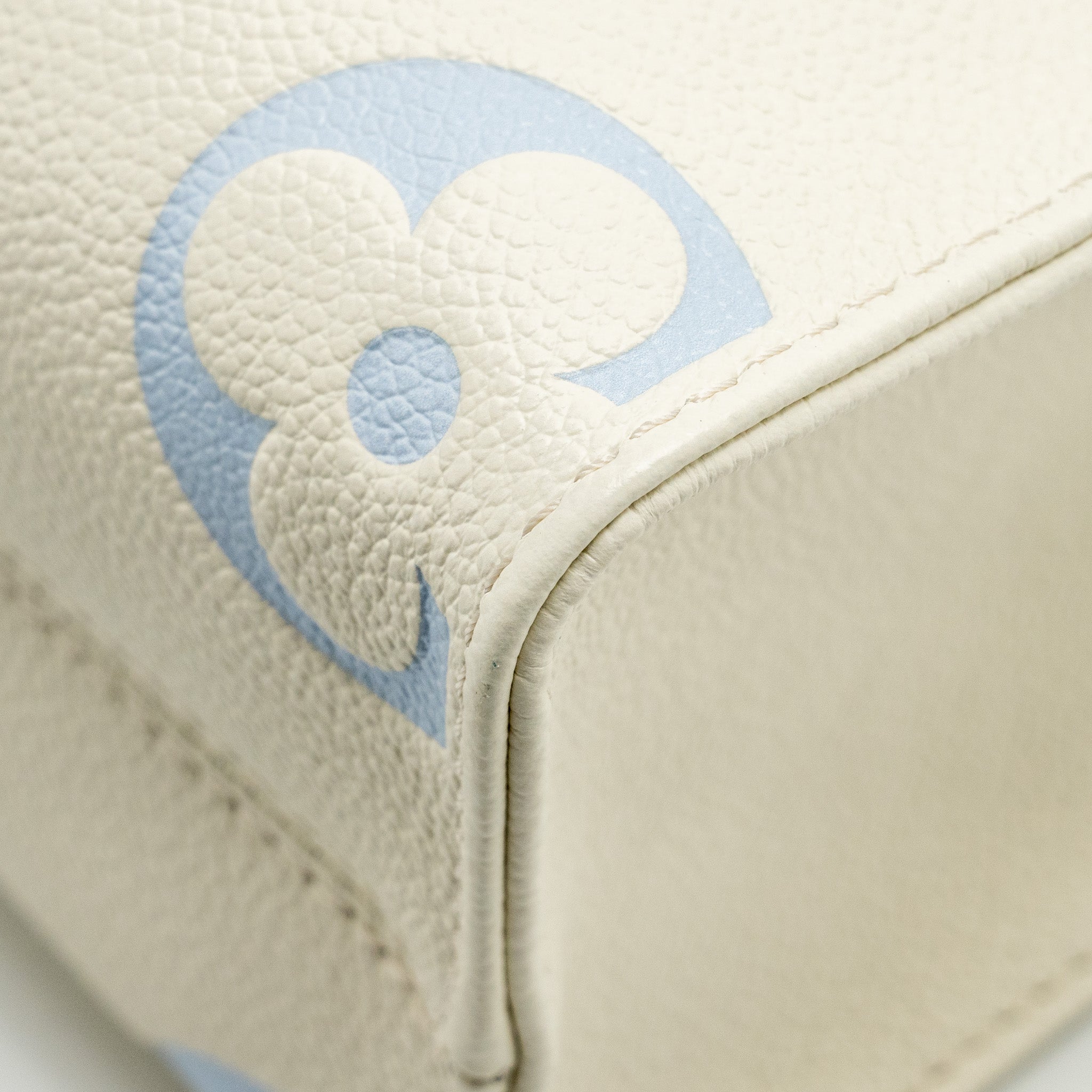 AAA Replica Louis Vuitton LV ONTHEGO PM BICOLOUR MONOGRAM EMPREINTE LATTE/CANDY BLUE GHW