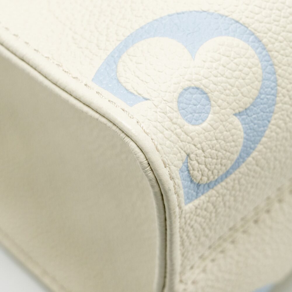AAA Replica Louis Vuitton LV ONTHEGO PM BICOLOUR MONOGRAM EMPREINTE LATTE/CANDY BLUE GHW