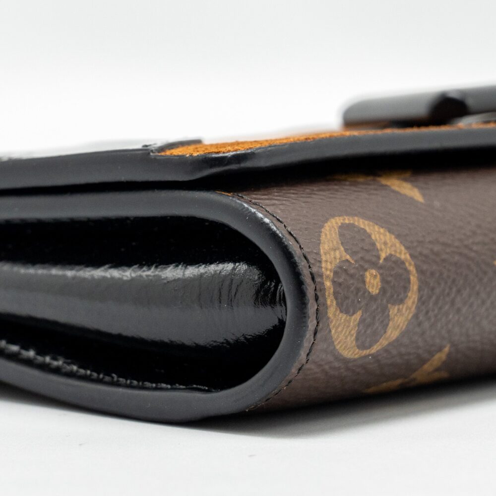 AAA Replica Louis Vuitton LV WILD AT HEART TWIST WALLET ON CHAIN CALFSKIN/MONOGRAM CANVAS MULTICOLOLUR BLACK/SLIVER HARDWARE