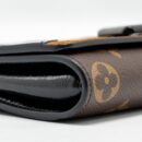 AAA Replica Louis Vuitton LV WILD AT HEART TWIST WALLET ON CHAIN CALFSKIN/MONOGRAM CANVAS MULTICOLOLUR BLACK/SLIVER HARDWARE