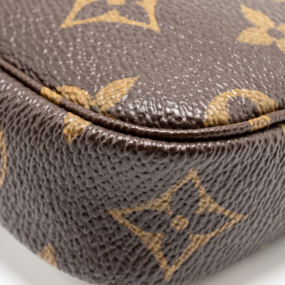 AAA Replica Louis Vuitton LV MINI POCHETTE HOLIDAY LIMITED PRINT MONOGRAM CANVAS GHW