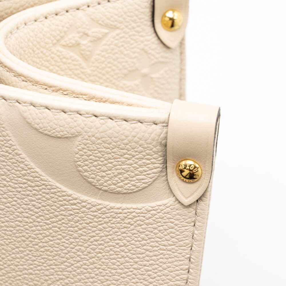 AAA Replica Louis Vuitton LV ONTHEGO MM EMPREINTE LEATHER WHITE GHW (NEW VERSION)