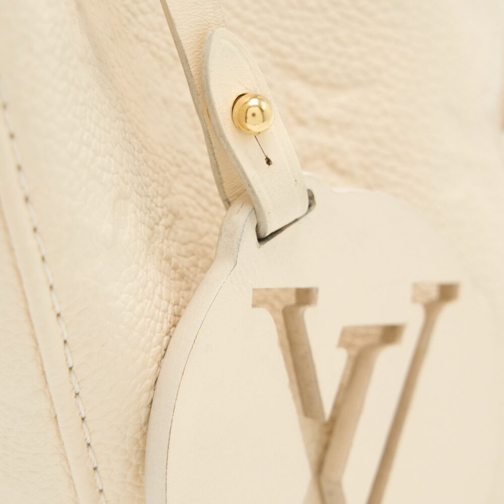AAA Replica Louis Vuitton LV MONTSOURIS BACKPACK MONOGRAM EMPREINTE CREAM GHW