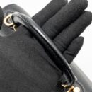 AAA Replica Louis Vuitton LV TWIST ONE HANDLE PM TAURILLON LEATHER BLACK/PINK GHW