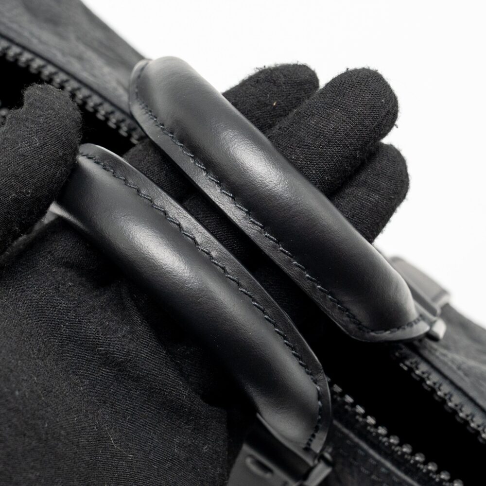 AAA Replica Louis Vuitton LV KEEPALL BANDOULIERE 25 MONOGRAM TAURILLON LEATHER BLACK WITH BLACK HARDWARE