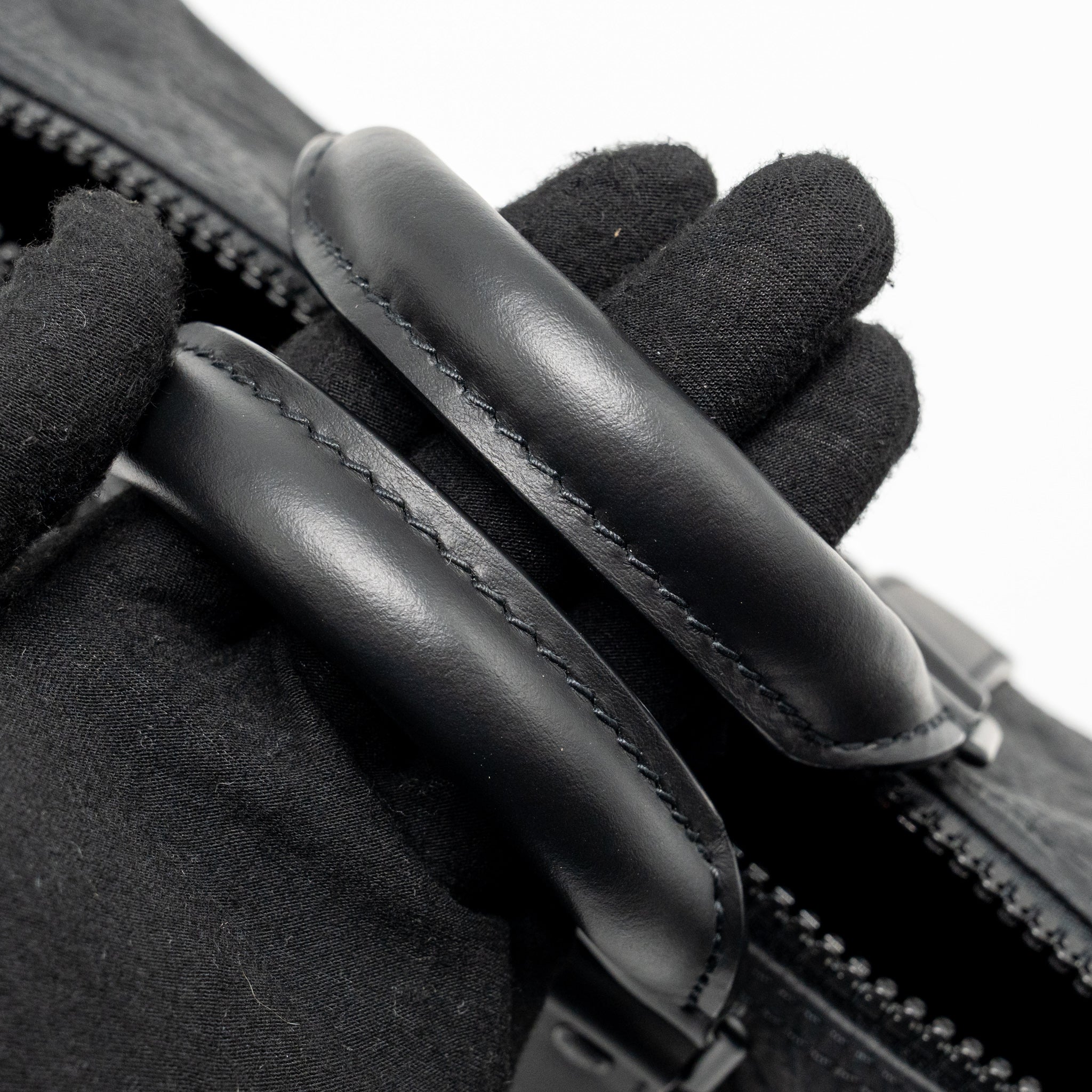 AAA Replica Louis Vuitton LV KEEPALL BANDOULIERE 25 MONOGRAM TAURILLON LEATHER BLACK WITH BLACK HARDWARE