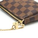 AAA Replica Louis Vuitton LV MINI POCHETTE ACCESSORIES DAMIER EBENE CANVAS