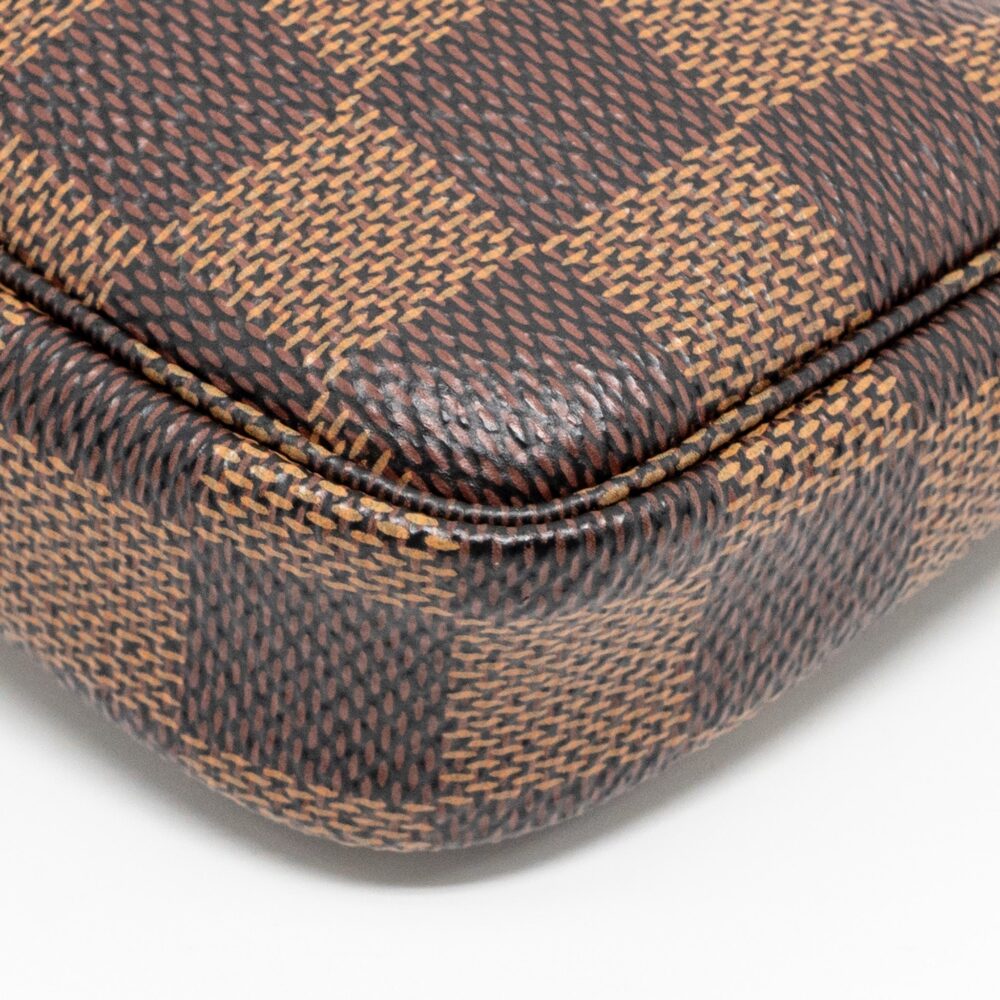 AAA Replica Louis Vuitton LV MINI POCHETTE ACCESSORIES DAMIER EBENE CANVAS GHW