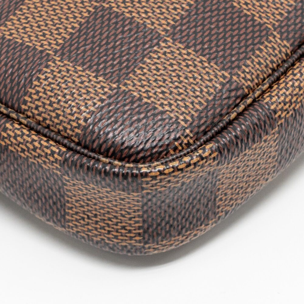 AAA Replica Louis Vuitton LV MINI POCHETTE ACCESSORIES DAMIER EBENE CANVAS GHW
