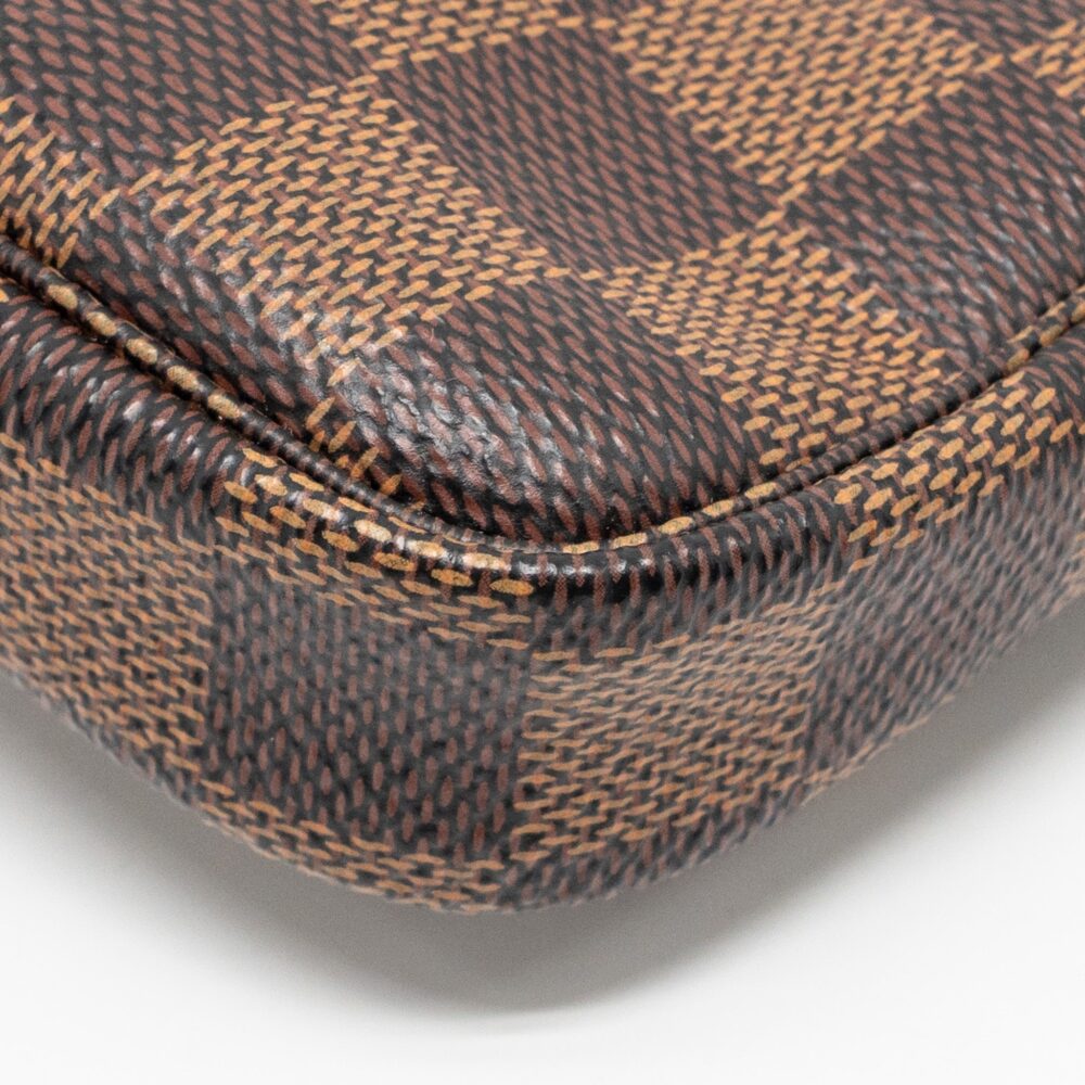 AAA Replica Louis Vuitton LV MINI POCHETTE ACCESSORIES DAMIER EBENE CANVAS GHW