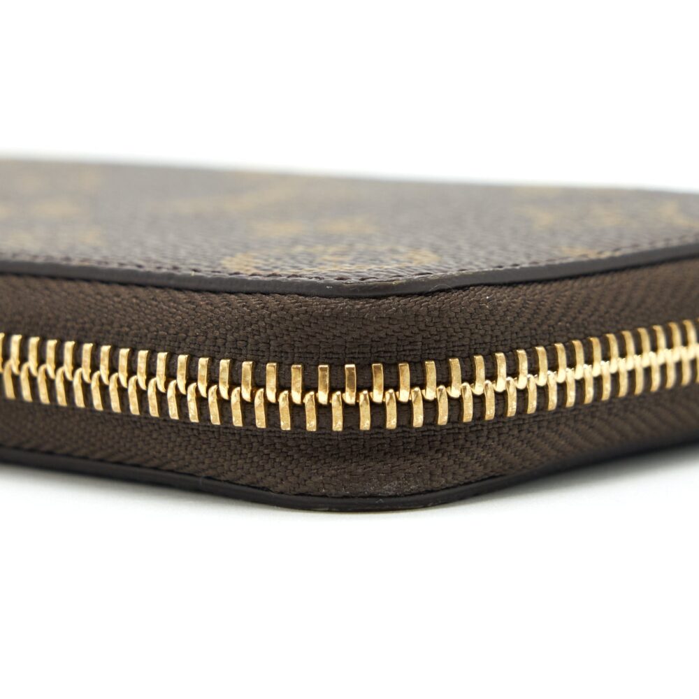 AAA Replica Louis Vuitton LV CLEMENCE LONG WALLET MONOGRAM CANVAS FUCHSIA