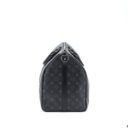 AAA Replica Louis Vuitton LV KEEPALL BANDOULIERE 50 MONOGRAM ECLIPSE CANVAS BLACK/GREY BLACK HARDWARE (NEW VERSION)