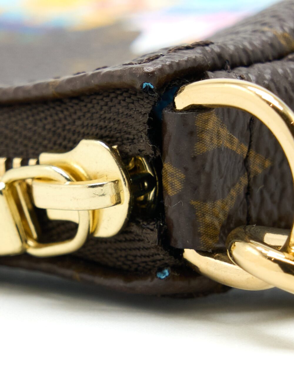 AAA Replica Louis Vuitton LV VIVIENNE HOLIDAYS MINI POCHETTE ACCESSORIES MONOGRAM CANVAS/MULTICOLOR GHW