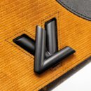 AAA Replica Louis Vuitton LV WILD AT HEART TWIST WALLET ON CHAIN CALFSKIN/MONOGRAM CANVAS MULTICOLOLUR BLACK/SLIVER HARDWARE